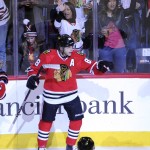 Chicago Blackhawks right wing Patrick Kane (88) celebrates his goal against the Arizona Coyotes in the second period of an NHL hockey game Tuesday, April 5, 2016, in Chicago. (AP Photo/David Banks)