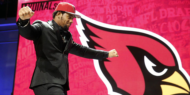 Mississippi's Robert Nkemdiche walks on the stage after being selected by Arizona Cardinals as the ...