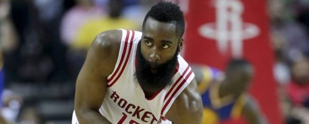 Houston Rockets guard James Harden celebrates a basket against the Golden State Warriors during the first half in Game 3 of a first-round NBA basketball playoff series, Thursday, April 21, 2016, in Houston. (AP Photo/David J. Phillip)