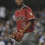 Arizona Diamondbacks starting pitcher Rubby De La Rosa walks off the field after being removed during the fifth inning of a baseball game after a pitch that hit Los Angeles Dodgers' Justin Turner, in Los Angeles on Wednesday, April 13, 2016. (AP Photo/Kelvin Kuo)