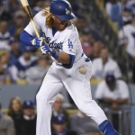 Los Angeles Dodgers' Justin Turner is hit by an Arizona Diamondbacks pitch during the fifth inning of a baseball game in Los Angeles, Wednesday, April 13, 2016. (AP Photo/Kelvin Kuo)