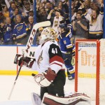 St. Louis Blues right wing Vladimir Tarasenko, back, reacts after scoring past Arizona Coyotes goaltender Mike Smith in the third period during an NHL hockey game Monday, April 4, 2016, in St. Louis. (Chris Lee/St. Louis Post-Dispatch via AP) MANDATORY CREDIT