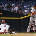 St. Louis Cardinals' Ruben Tejada (19) runs back to the dugout after he doubles up Arizona Diamondbacks' Jean Segura (2) off of third base as umpire Adam Hamari, left, makes the out call during the first inning of a baseball game Wednesday, April 27, 2016, in Phoenix. (AP Photo/Ross D. Franklin)