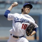 Los Angeles Dodgers starting pitcher Kenta Maeda throws to the plate against the Arizona Diamondbacks during the first inning of a baseball game in Los Angeles, Tuesday, April 12, 2016. (AP Photo/Alex Gallardo)
