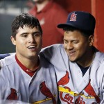 St. Louis Cardinals' Aledmys Diaz, left, celebrates his home run against the Arizona Diamondbacks with Carlos Martinez, right, during the fifth inning of a baseball game Wednesday, April 27, 2016, in Phoenix. (AP Photo/Ross D. Franklin)