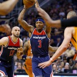 Washington Wizards guard Bradley Beal (3) looks to pass against the Phoenix Suns during the first half of an NBA basketball game Friday, April 1, 2016, in Phoenix. (AP Photo/Matt York)