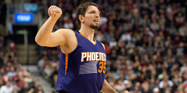 Phoenix Suns' Mirza Teletovic reacts after making a three-point shot during the second half of an N...