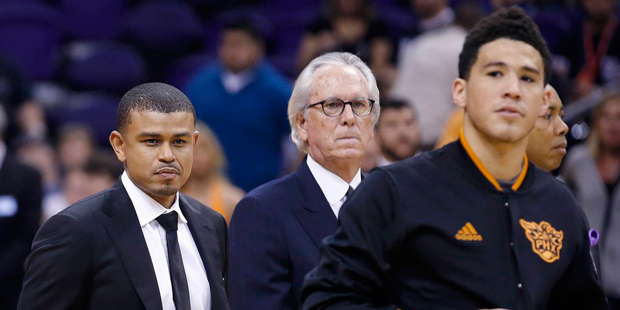 In this Wednesday, April 13, 2016, photo, Phoenix Suns coach Earl Watson, left, stands next to assi...