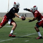QB Jake Coker hands the ball off to RB Jared Baker during Cardinals rookie mini-camp Friday, May 6. (Photo by Adam Green/Arizona Sports)