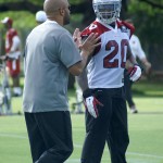 Inside linebackers coach Larry Foote chats with Deone Bucannon during Arizona Cardinals OTAs Tuesday, May 17. (Photo by Adam Green/Arizona Sports)