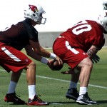 Center Evan Boehm snaps the ball to QB Jake Coker during Cardinals rookie mini-camp Friday, May 6. (Photo by Adam Green/Arizona Sports)