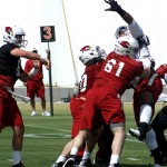 Defensive lineman Robert Nkemdiche reaches up while being double-teamed during Cardinals rookie mini-camp Friday, May 6. (Photo by Adam Green/Arizona Sports)
