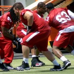 Offensive lineman go through a drill during Cardinals rookie mini-camp Friday, May 6. (Photo by Adam Green/Arizona Sports)