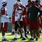 Safety Tyrann Mathieu (32) smiles while chatting with Justin Bethel (28) during OTAs Tuesday, May 31. (Photo by Adam Green/Arizona Sports)