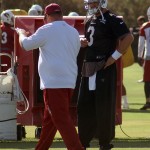 Quarterback Carson Palmer receives instruction from coach Freddie Kitchens during OTAs May 24, 2016. (Photo by Adam Green/Arizona Sports)