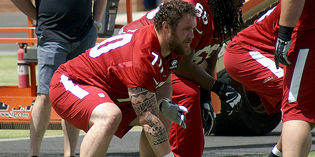 Rookie center Evan Boehm goes through a drill during Cardinals rookie mini-camp. (Photo by Adam Gre...