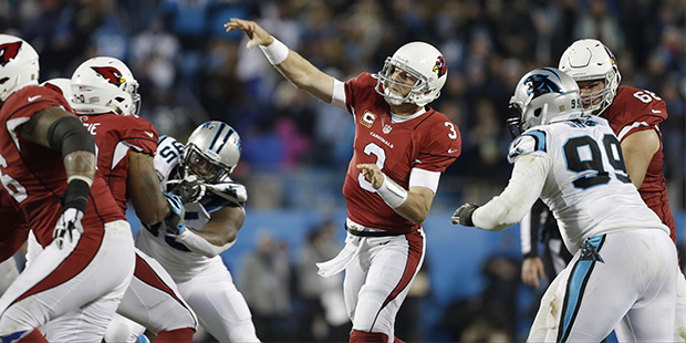 Arizona Cardinals' Carson Palmer throws during the first half the NFL football NFC Championship gam...