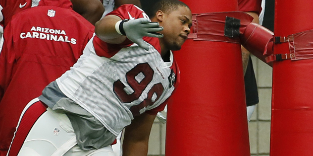 Arizona Cardinals' Corey Peters (98) works out during an NFL football training camp, Wednesday, Aug...