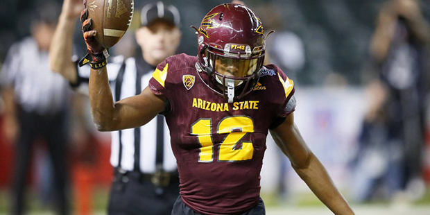 Arizona State wide receiver Tim White (12) signals touchdown after scoring during the second half o...