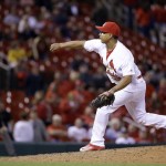 St. Louis Cardinals' Ruben Tejada pitches during the ninth inning of a baseball game against the Arizona Diamondbacks on Friday, May 20, 2016, in St. Louis. (AP Photo/Jeff Roberson)