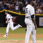 New York Yankees' Michael Pineda (35) pauses at the mound after giving up a two-run home run to Arizona Diamondbacks' Jake Lamb, rear, during the fifth inning of a baseball game Tuesday, May 17, 2016, in Phoenix. (AP Photo/Ross D. Franklin)