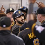 Pittsburgh Pirates' Sean Rodriguez, center, celebrates in the dugout after hitting a solo home run off Arizona Diamondbacks starting pitcher Rubby De La Rosa in the fourth inning of a baseball game in Pittsburgh, Wednesday, May 25, 2016. (AP Photo/Gene J. Puskar)