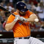 Houston Astros' Evan Gattis is brushed back by an inside pitch during the first inning of a baseball game against the Arizona Diamondbacks, Tuesday, May 31, 2016, in Phoenix. (AP Photo/Matt York)