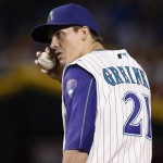Arizona Diamondbacks' Zack Greinke pauses on the mound after giving up a second run to the San Francisco Giants during the fourth inning of a baseball game Thursday, May 12, 2016, in Phoenix. (AP Photo/Ross D. Franklin)