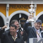 Principal partner of Big Chief Racing Matt Bryan, right, celebrates with other team members after Exaggerator with Kent Desormeaux aboard won  the 141st Preakness Stakes horse race at Pimlico Race Course, Saturday, May 21, 2016, in Baltimore.  (AP Photo/Matt Slocum)