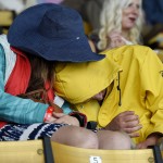 A couple naps in the grandstands ahead of the 141st Preakness Stakes horse race at Pimlico Race Course, Saturday, May 21, 2016, in Baltimore.  (AP Photo/Nick Wass)