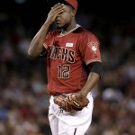 Arizona Diamondbacks starting pitcher Rubby De La Rosa rubs his face after giving up a home run during the third inning of a baseball game against the San Francisco Giants, Sunday, May 15, 2016, in Phoenix. (AP Photo/Matt York)
