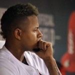 St. Louis Cardinals starting pitcher Carlos Martinez stands in the dugout after working during the fifth inning of a baseball game against the Arizona Diamondbacks Friday, May 20, 2016, in St. Louis. (AP Photo/Jeff Roberson)