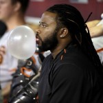 San Francisco Giants' Johnny Cueto blows a bubble in the dugout during the seventh inning of a baseball game against the Arizona Diamondbacks, Sunday, May 15, 2016, in Phoenix. (AP Photo/Matt York)