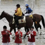 The All-Star Buglers perform before the first race of the day ahead of the 141st Preakness Stakes horse race at Pimlico Race Course, Saturday, May 21, 2016, in Baltimore.  (AP Photo/Matt Slocum)