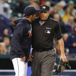 Detroit Tigers manager Brad Ausmus, left, yells at home plate umpire Jeff Nelson against the Minnesota Twins in the fourth inning of a baseball game Monday, May 16, 2016 in Detroit. Ausmus was thrown out of the game. (AP Photo/Paul Sancya)