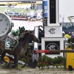 Exaggerator with Kent Desormeaux aboard wins the 141st Preakness Stakes horse race at Pimlico Race Course, Saturday, May 21, 2016, in Baltimore.  (AP Photo/Mike Stewart)
