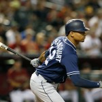 San Diego Padres Christian Bethancourt hits an RBI-single in the second inning during a baseball game against the Arizona Diamondbacks, Sunday, May 29, 2016, in Phoenix. (AP Photo/Rick Scuteri)