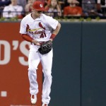A ball hit by Arizona Diamondbacks' Patrick Corbin bounces past St. Louis Cardinals center fielder Jeremy Hazelbaker for a single during the fifth inning of a baseball game Friday, May 20, 2016, in St. Louis. Hazelbaker was charged with an error and Corbin advanced to second on the play. (AP Photo/Jeff Roberson)