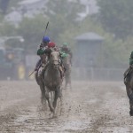 Exaggerator, right, with Kent Desormeaux aboard wins the 141st Preakness Stakes horse race at Pimlico Race Course, Saturday, May 21, 2016, in Baltimore. Cherry Wine, left, with Corey Lanerie aboard places second and Nyquist with Mario Gutierrez riding placed third. (AP Photo/Patrick Semansky)