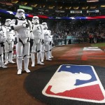 Star Wars characters Stormtroopers stand for the national anthem on Star Wars Night prior to a baseball game between the Arizona Diamondbacks and the San Francisco Giants Saturday, May 14, 2016, in Phoenix. (AP Photo/Ross D. Franklin)