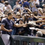 New York Yankees' Alex Rodriguez signs autographs for fans prior to a baseball game against the Arizona Diamondbacks Tuesday, May 17, 2016, in Phoenix. (AP Photo/Ross D. Franklin)