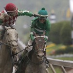 Kent Desormeaux riding Exaggerator is congratulated by Corey Lanerie atop Cherry Wine after the 141st Preakness Stakes horse race at Pimlico Race Course, Saturday, May 21, 2016, in Baltimore. Exaggerator won the race. (AP Photo/Patrick Semansky)