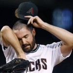 Arizona Diamondbacks' Robbie Ray pauses on the mound after giving up a run to the San Diego Padres during the third inning of a baseball game Friday, May 27, 2016, in Phoenix. (AP Photo/Ross D. Franklin)