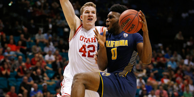 California forward Jaylen Brown, right, drives into Utah forward Jakob Poeltl during the second hal...