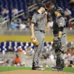 Arizona Diamondbacks starting pitcher Robbie Ray, left, talks with Arizona Diamondbacks catcher Welington Castillo, right, during the fourth inning of a baseball game against the Miami Marlins, Thursday, May 5, 2016, in Miami. (AP Photo/Lynne Sladky)