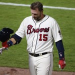 Atlanta Braves catcher A.J. Pierzynski (15) flips his batting helmet as he walks to the dugout after flying out in the sixth inning of a baseball game against the Arizona Diamondbacks, Saturday, May 7, 2016, in Atlanta. (AP Photo/John Bazemore)