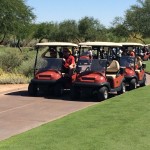 Golfers head out in their carts at the start of Calais Campbell’s fourth annual Celebrity Golf Classic. (Photo by Mike Boylan/Cronkite News)