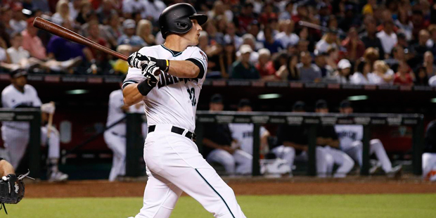 Arizona Diamondbacks' Jake Lamb connects for a two-run home run against the New York Yankees during...