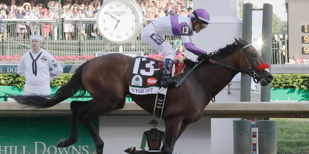 Mario Guitierrez rides Nyquist to victory during the 142nd running of the Kentucky Derby horse race...