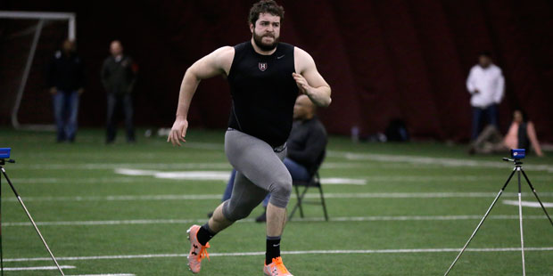 Harvard offensive tackle Cole Toner does the 40 yard dash during an NFL football Pro Day Thursday, ...